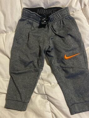 Nike Kids Gray Sweatpants with Orange Swoosh